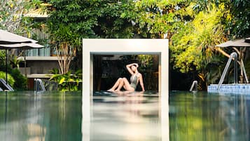 Outdoor pool, open 6:00 AM to 8:00 PM, pool umbrellas, sun loungers