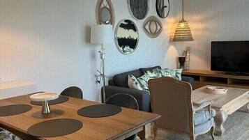 Suite Premier, vista al mar | Ropa de cama de alta calidad y minibar