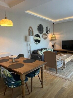 Suite Premier, vista al mar | 1 habitación, ropa de cama de alta calidad y minibar 