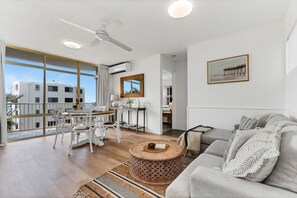 1 Bedroom Apartment with Ocean View | Living area | 40-inch flat-screen TV with cable channels, TV, DVD player - Surf Dance (Coolum Beach)