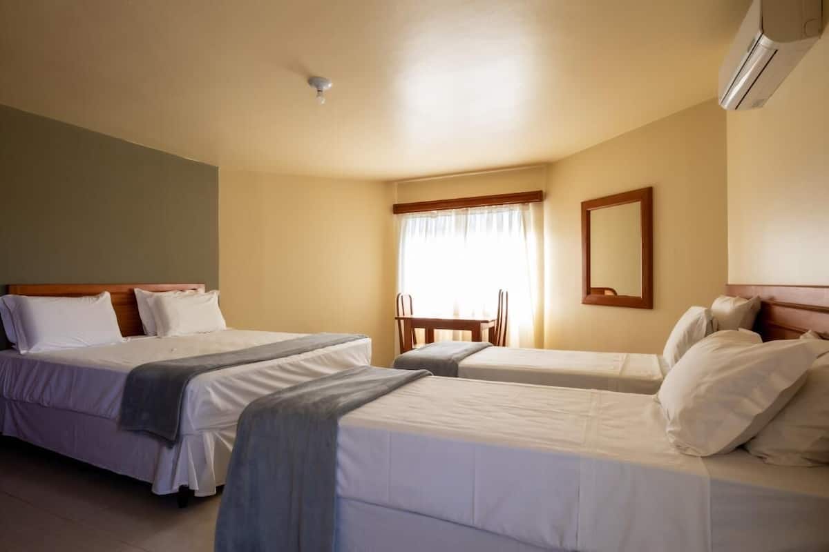 Hypo-allergenic bedding, minibar, in-room safe, laptop workspace