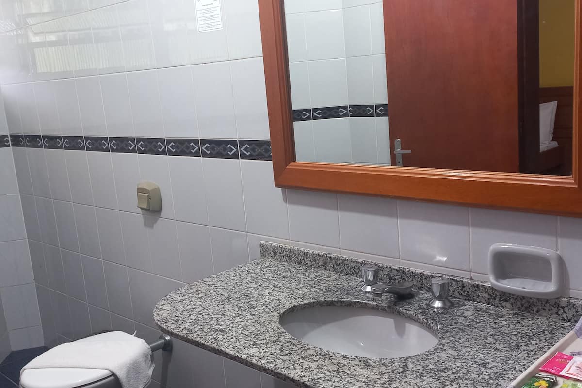 standard quadruple room, multiple beds, private bathroom, garden view | bathroom | shower, free toiletries, hair dryer, bathrobes