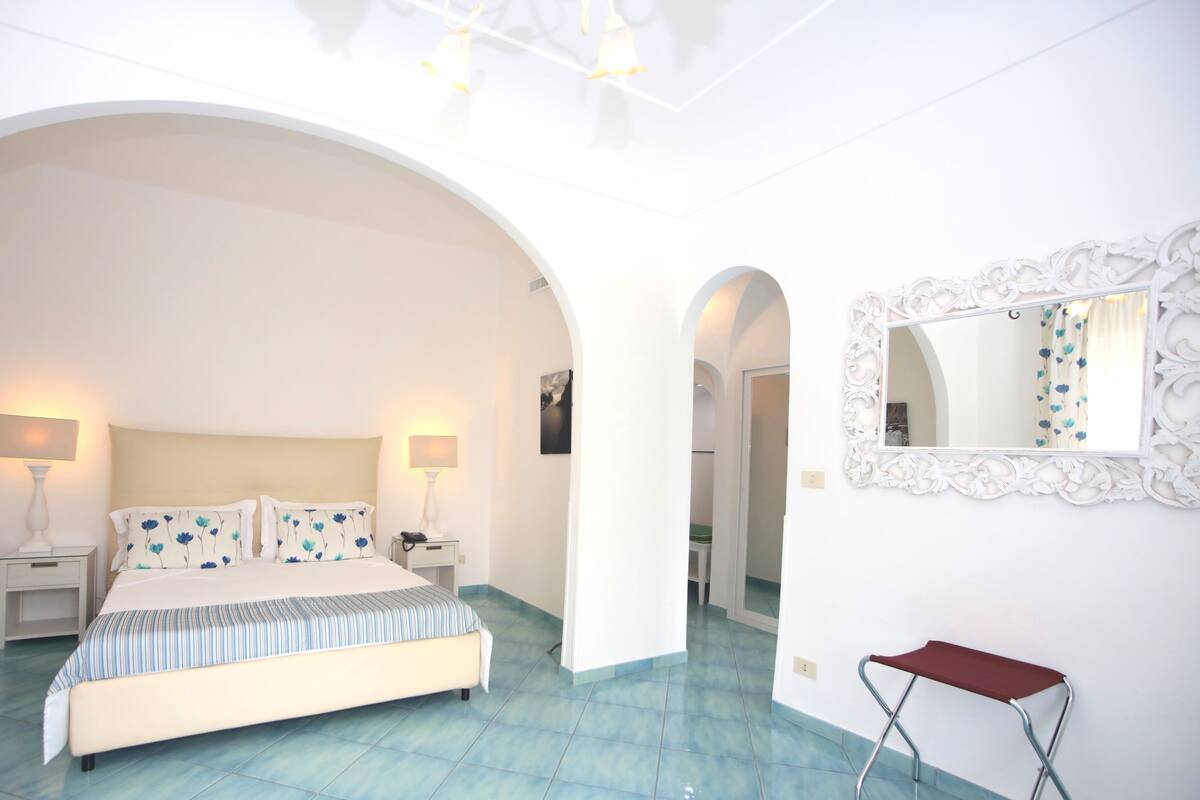 Deluxe Double Room, Terrace, Garden View | Minibar, in-room safe, blackout curtains, free WiFi