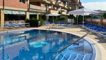 Outdoor pool, open 8:00 AM to 9:00 PM, sun loungers