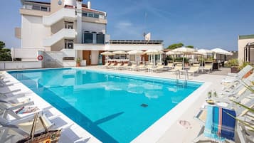 Outdoor pool, pool umbrellas, pool loungers