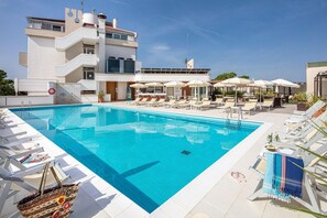 Outdoor pool, pool umbrellas, pool loungers