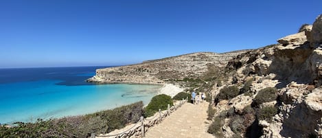 Sulla spiaggia, immersioni subacquee, snorkeling, pesca