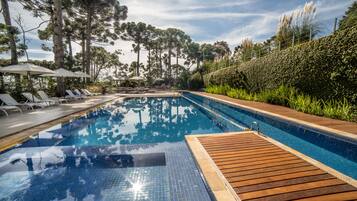 Outdoor pool, pool umbrellas, sun loungers