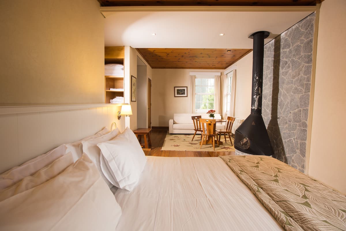 alpino luxury chalet | premium bedding, pillow-top beds, minibar, in-room safe