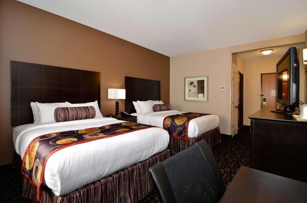 Desk, blackout drapes, iron/ironing board, rollaway beds