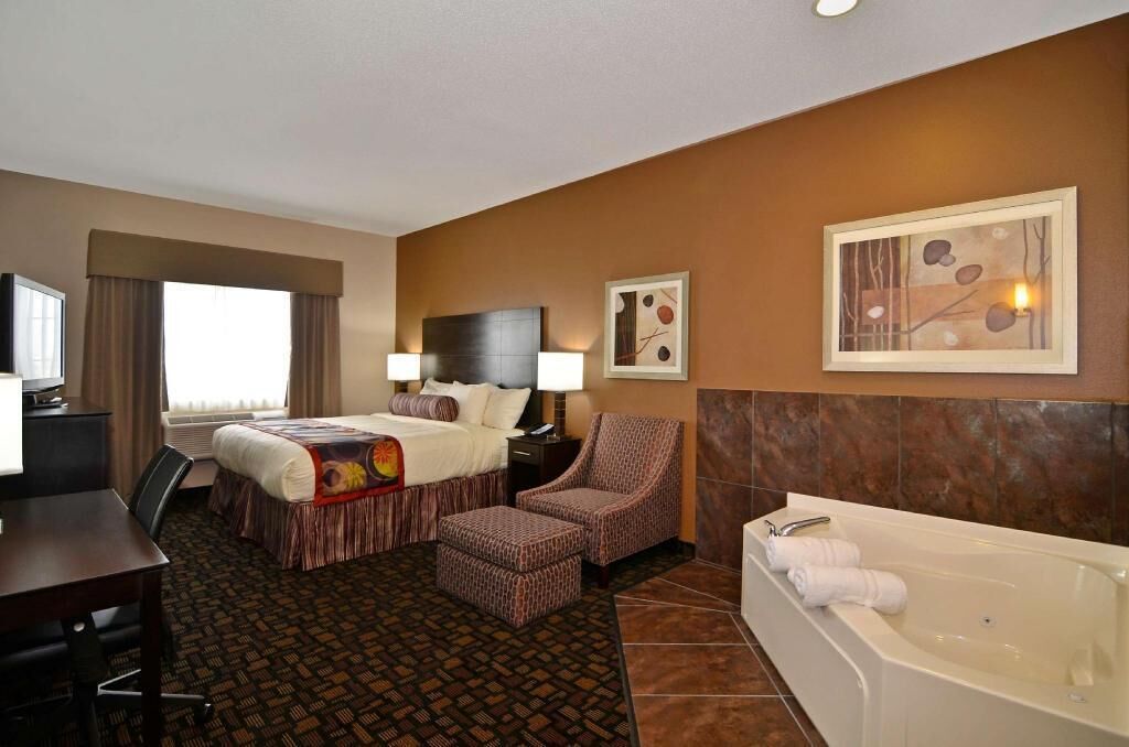 Desk, blackout drapes, iron/ironing board, rollaway beds