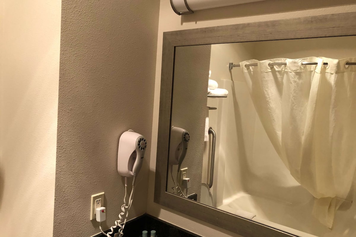 desk, blackout curtains, iron/ironing board, rollaway beds