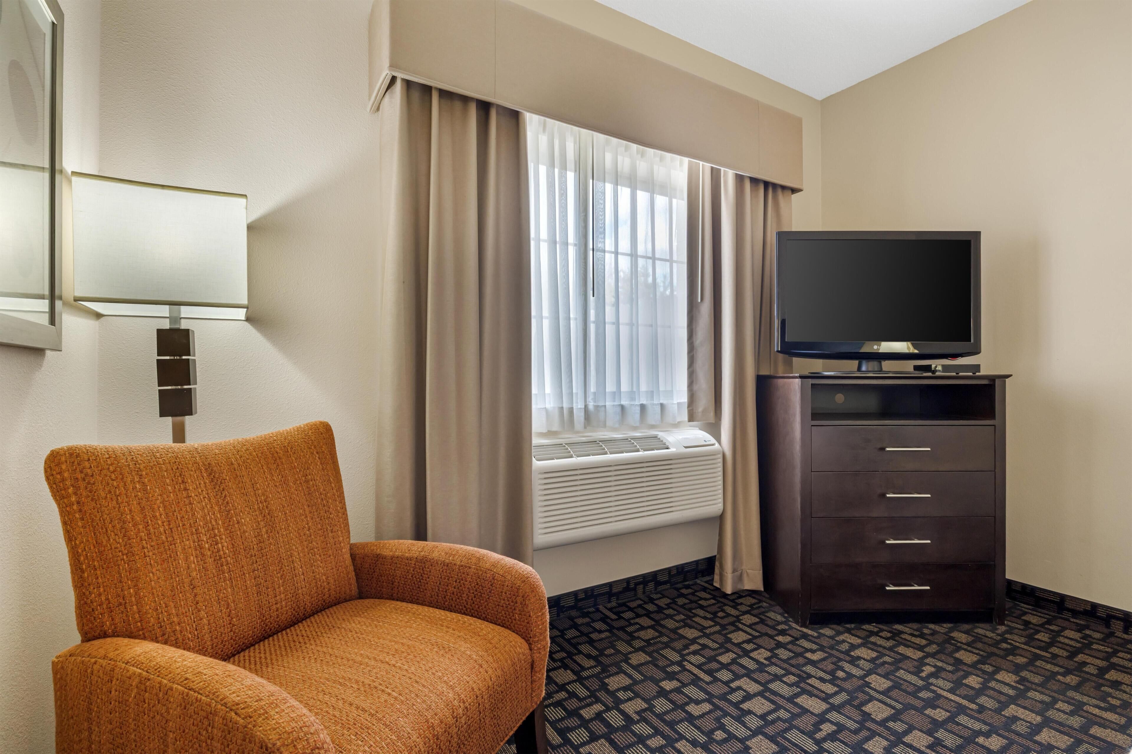 Desk, blackout drapes, iron/ironing board, rollaway beds