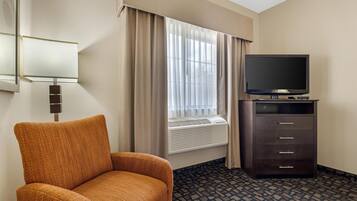 Desk, blackout drapes, iron/ironing board, rollaway beds