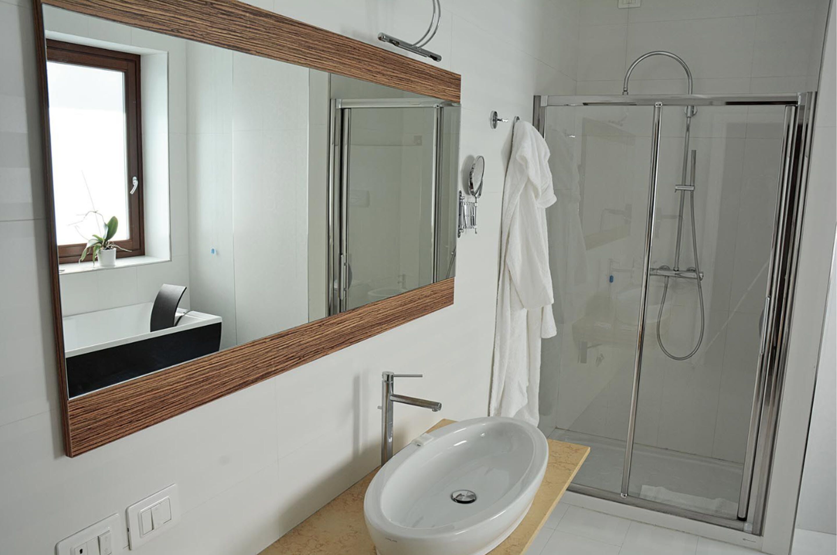 suite | bathroom | hair dryer, bidet, towels