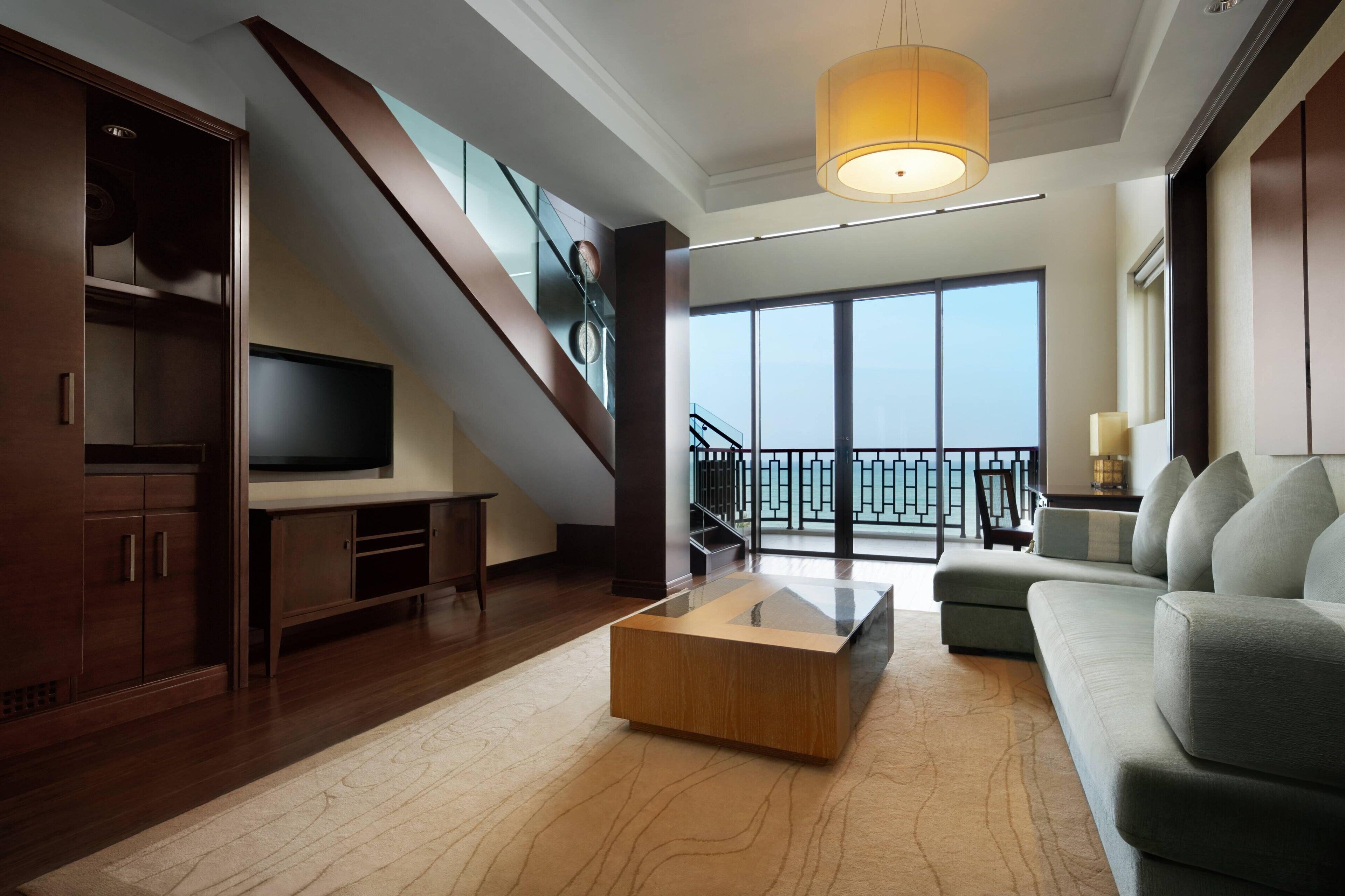 suite, 1 bedroom, ocean view, mezzanine | living room | led tv, dvd player, pay films