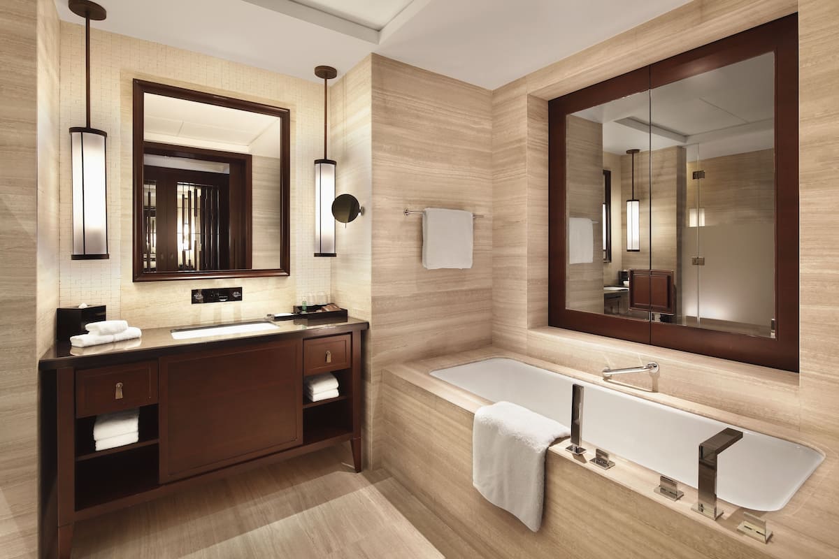 separate bathtub and shower, free toiletries, hair dryer, bathrobes