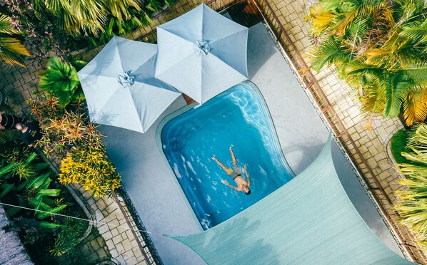 Outdoor pool, open 7:00 AM to 9:30 PM, pool umbrellas, sun loungers