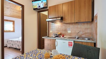 Bungalow, 1 chambre | Coin séjour