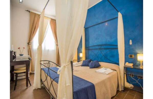 Double Room | Frette Italian sheets, Select Comfort beds, minibar, in-room safe