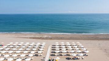 On the beach, beach volleyball