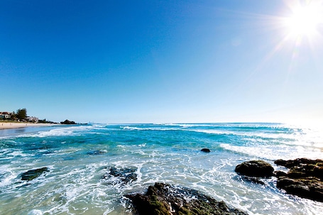 On the beach, white sand, surfing