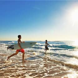 On the beach, white sand, surfing