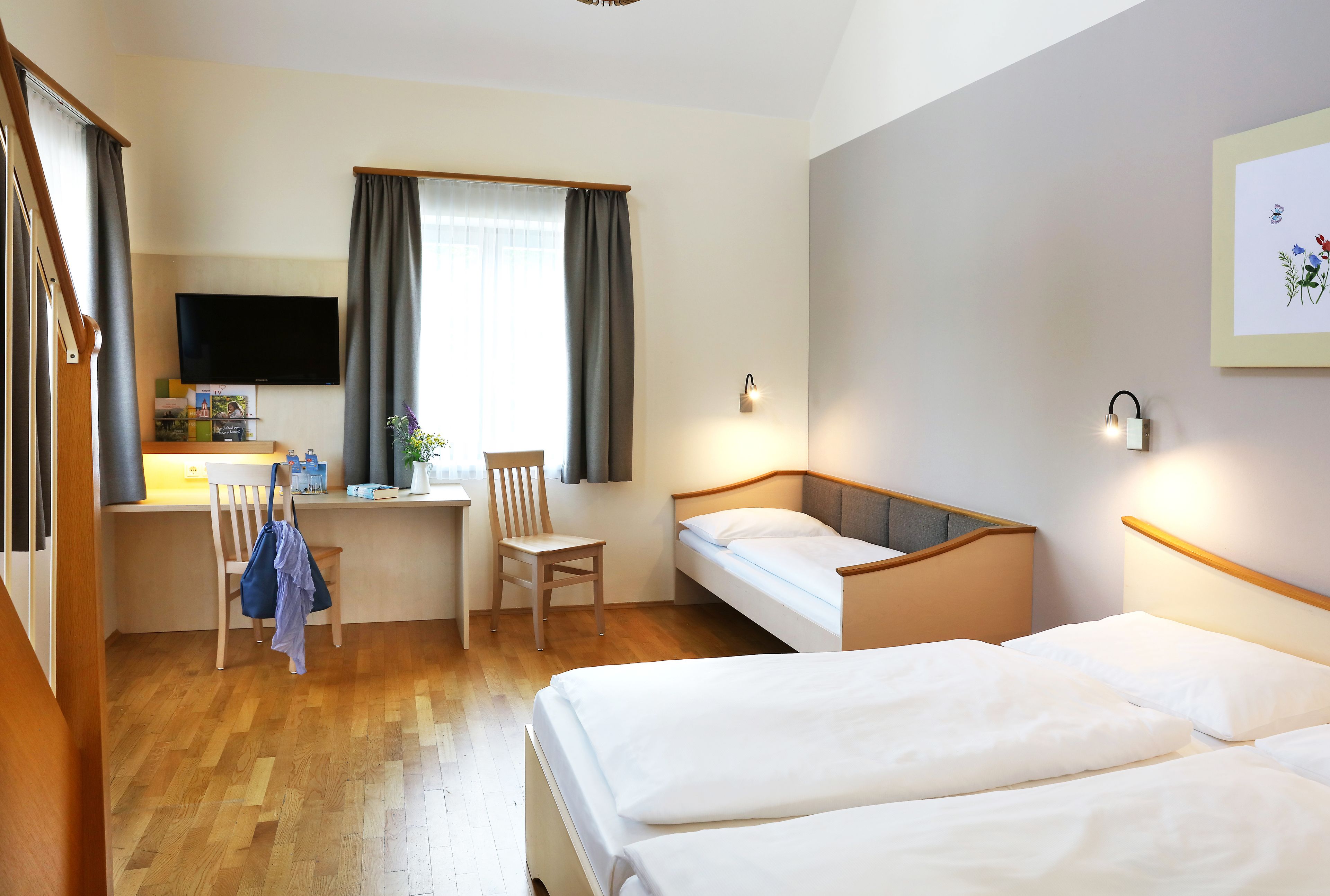 comfort quadruple room | in-room safe, desk, free wifi, bed sheets