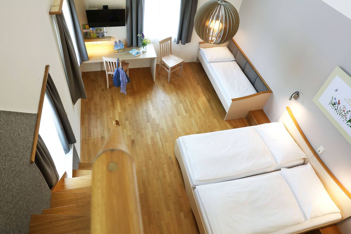 comfort quadruple room | in-room safe, desk, free wifi, bed sheets