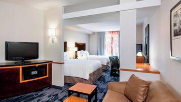 Hypo-allergenic bedding, down comforters, desk, blackout drapes