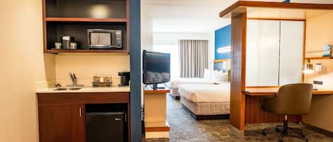 Premium bedding, down comforters, pillowtop beds, minibar