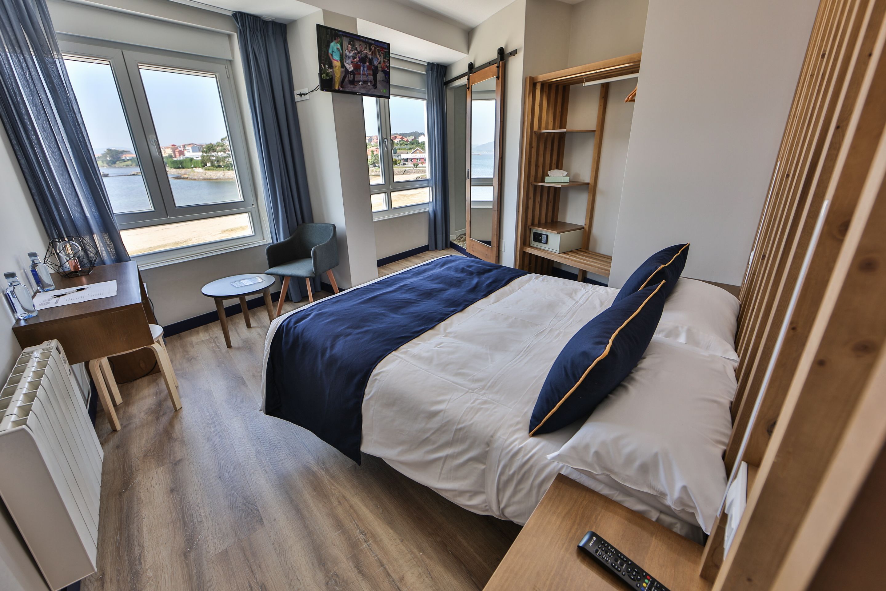 double room, 1 queen bed, sea view | down duvets, memory-foam beds, iron/ironing board, cots/infant beds