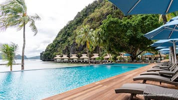 Outdoor pool, pool umbrellas, pool loungers