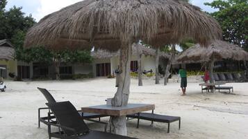 On the beach, kayaking