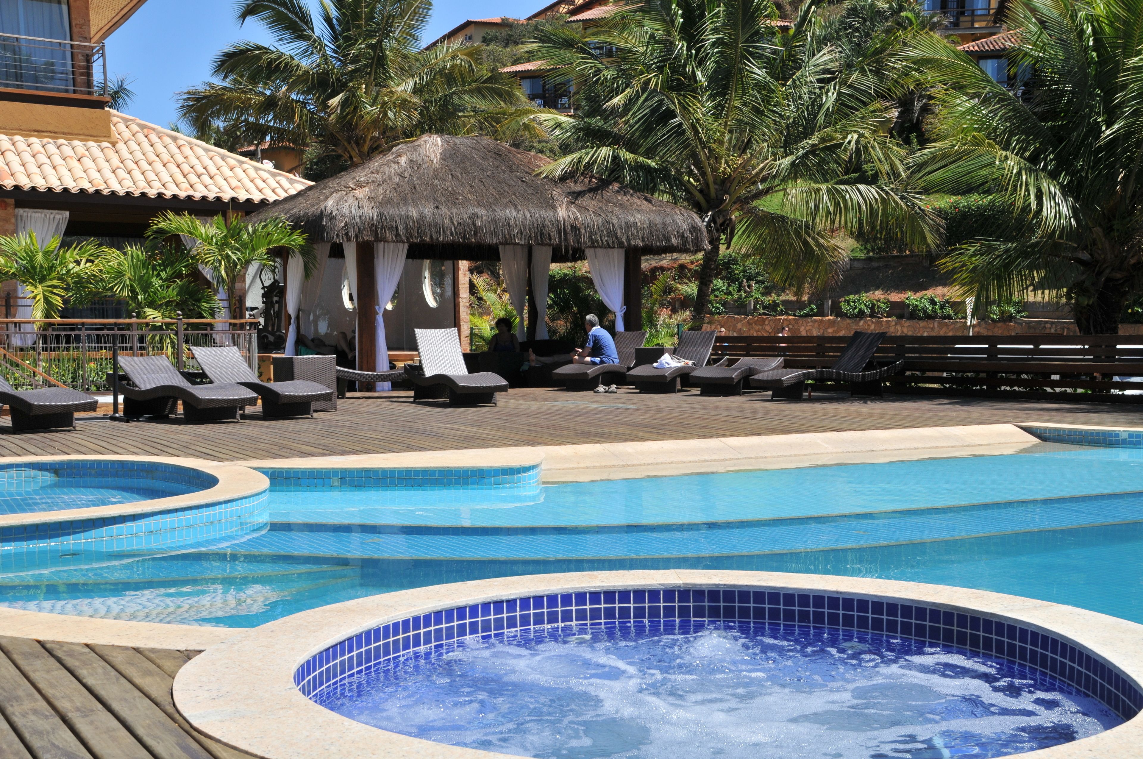 outdoor pool, pool umbrellas, pool loungers