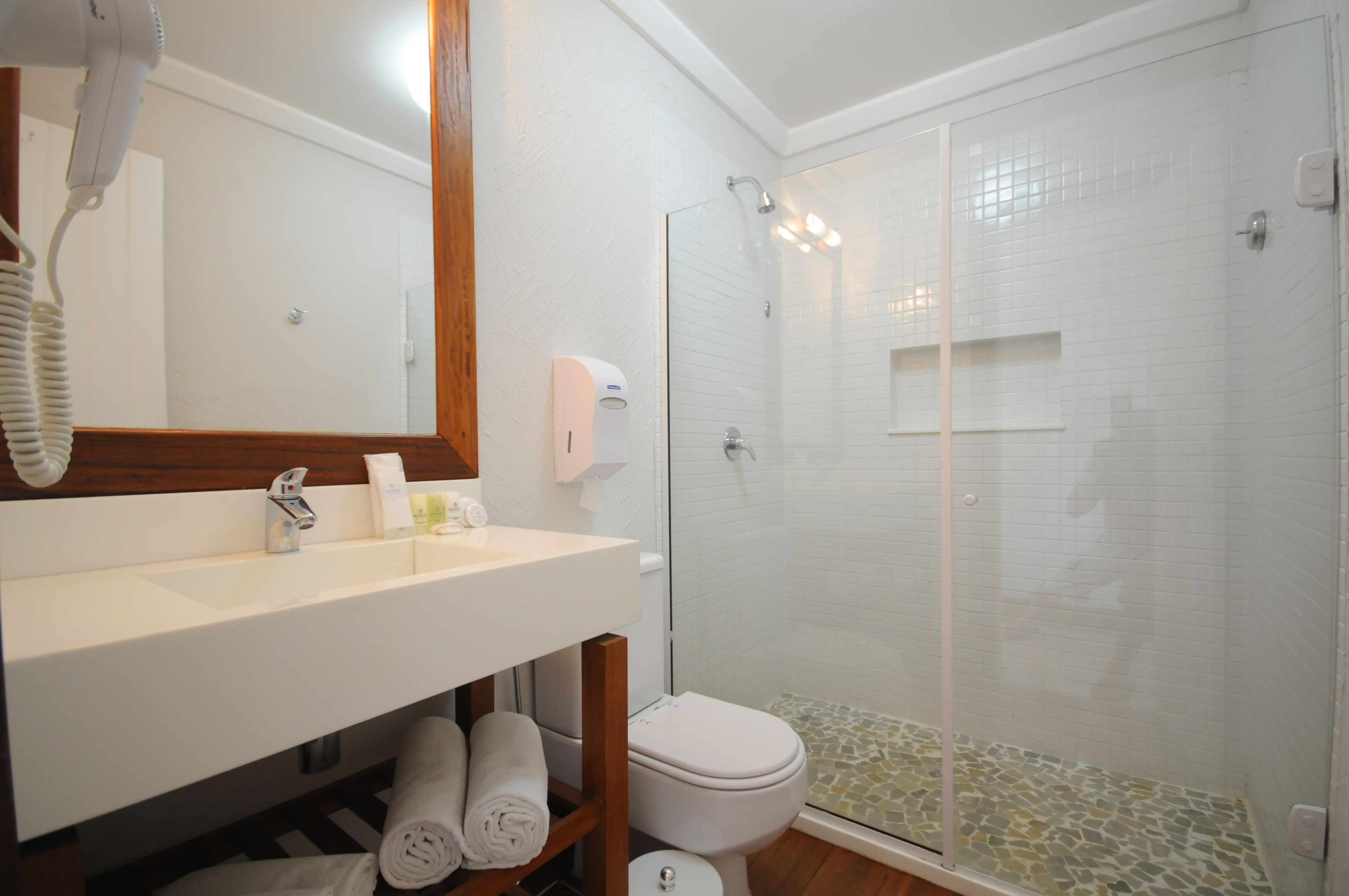 shower, hair dryer, bidet, towels