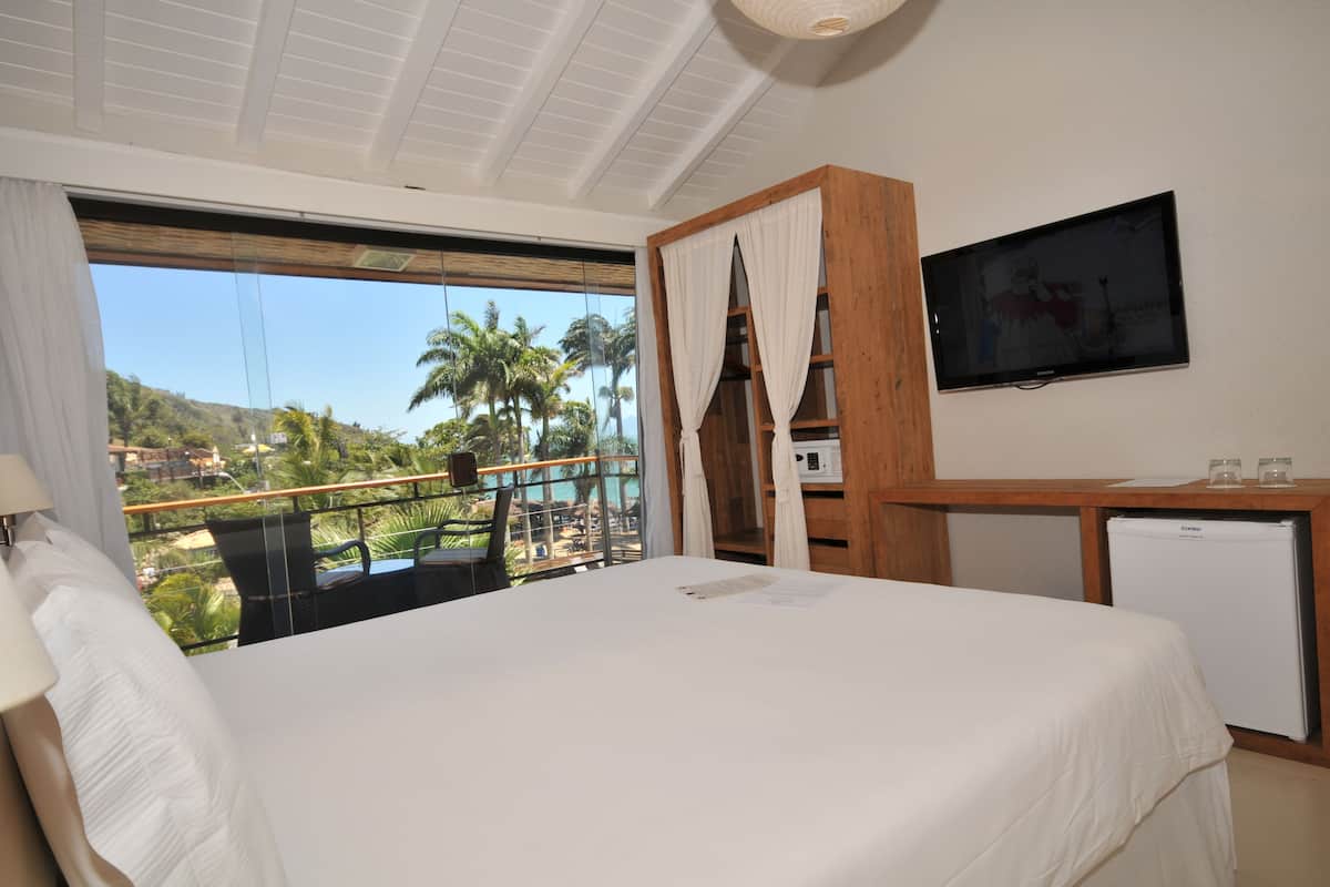 Deluxe Double Room, Patio, Sea Facing | In-room safe, blackout curtains, free WiFi, bed sheets