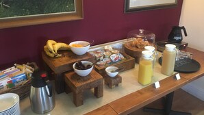 A breakfast buffet with various food items and beverages. - The Marsham Arms Inn (Norwich)