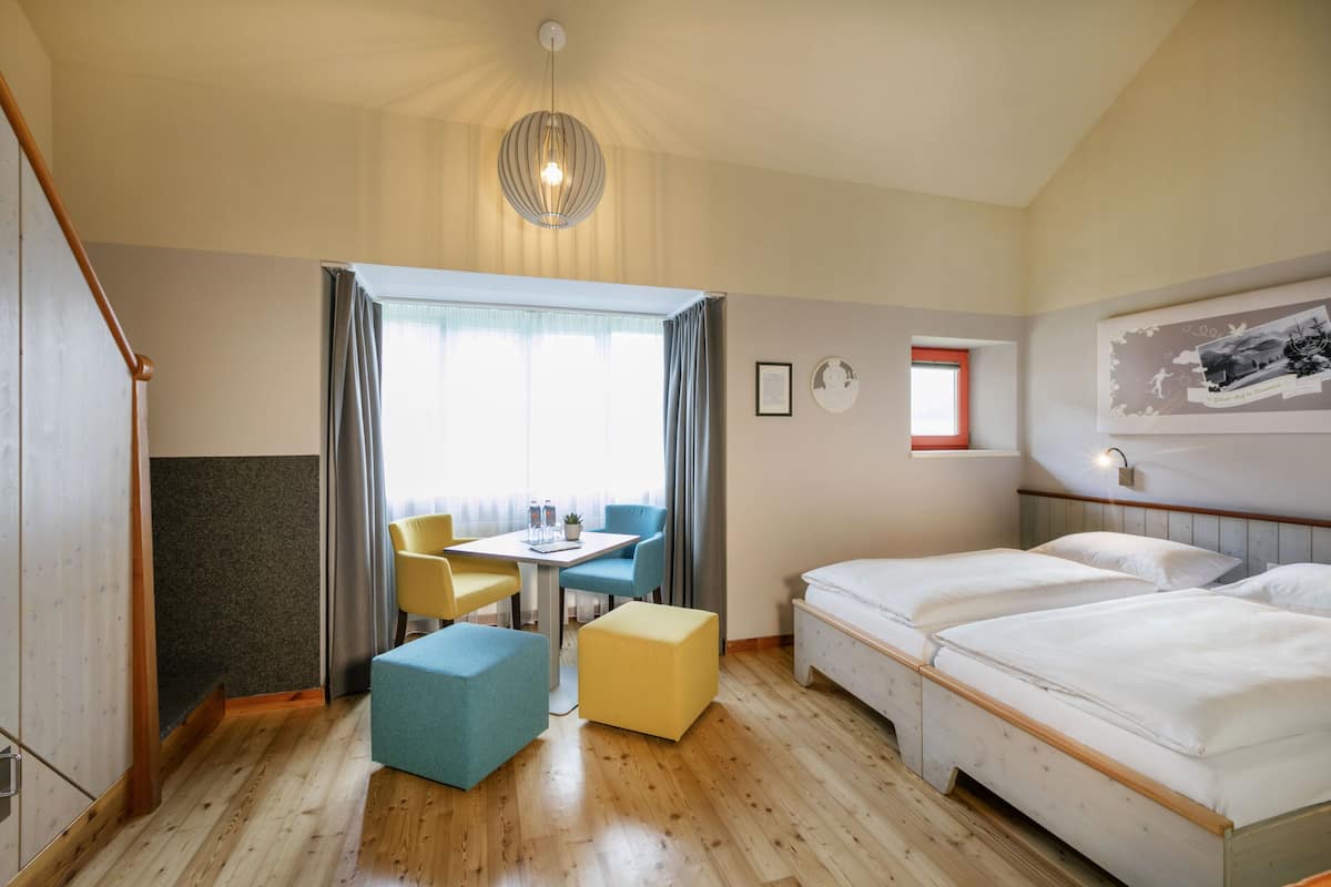 comfort quadruple room | in-room safe, desk, blackout curtains, free wifi