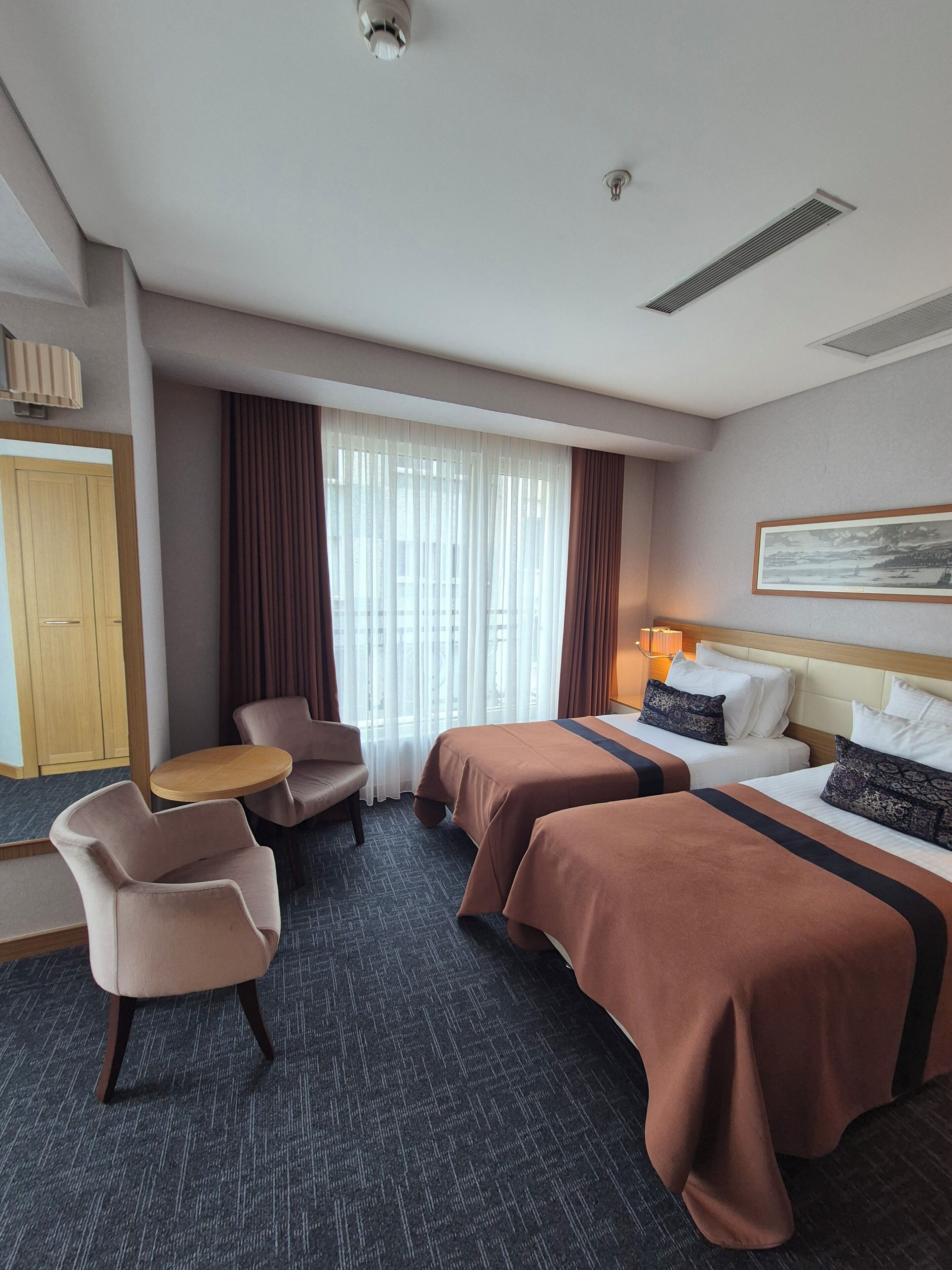 Egyptian cotton sheets, premium bedding, minibar, in-room safe