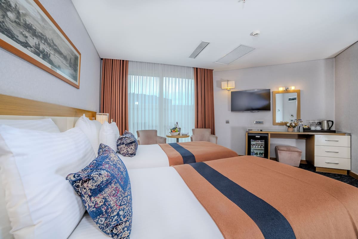 Egyptian cotton sheets, premium bedding, minibar, in-room safe