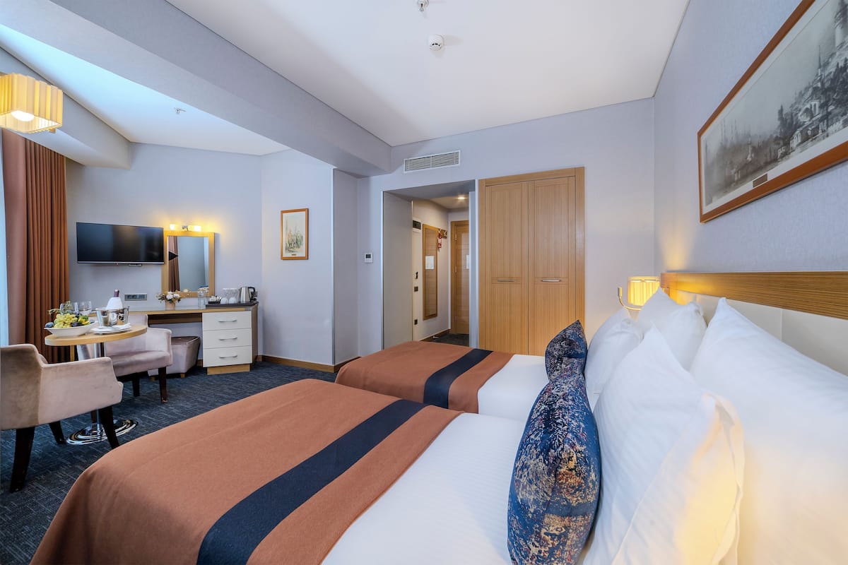 Ropa de cama de alta calidad y minibar