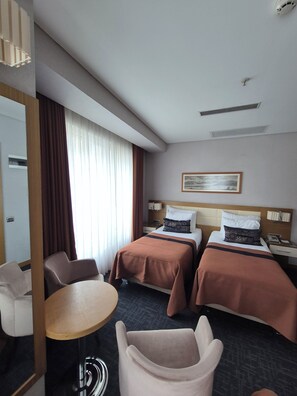 Deluxe Twin Room | Living area | 22-inch LCD TV with cable channels, TV - Hotel Momento - Special Class (Istanbul)