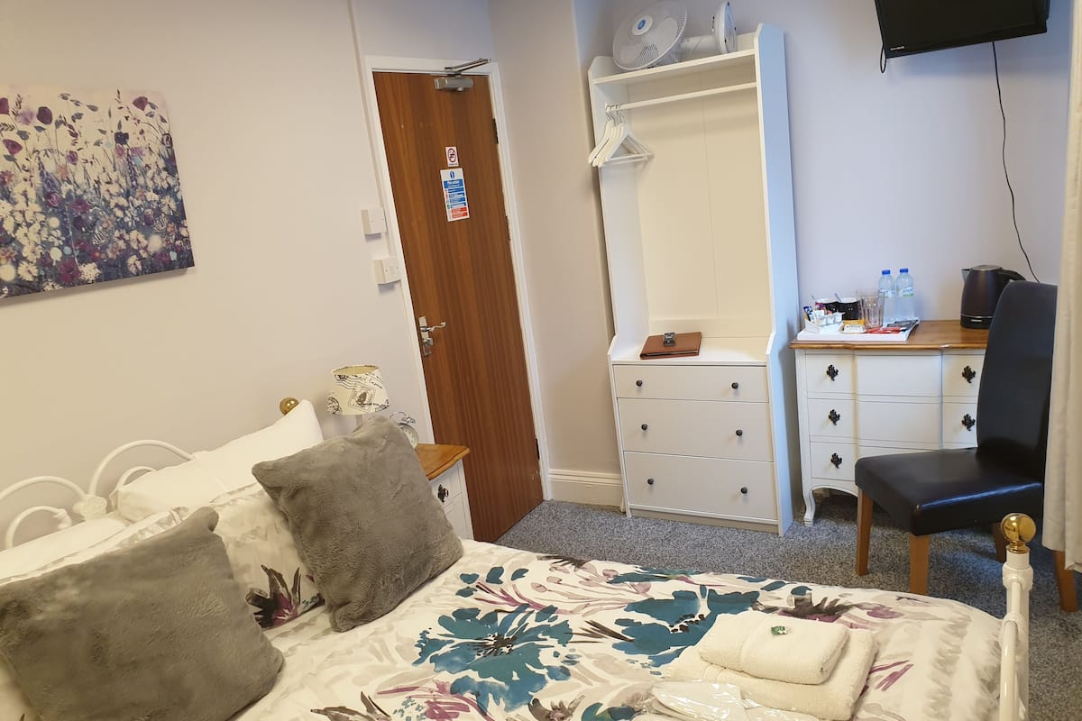 Premium bedding, memory-foam beds, blackout curtains, iron/ironing board