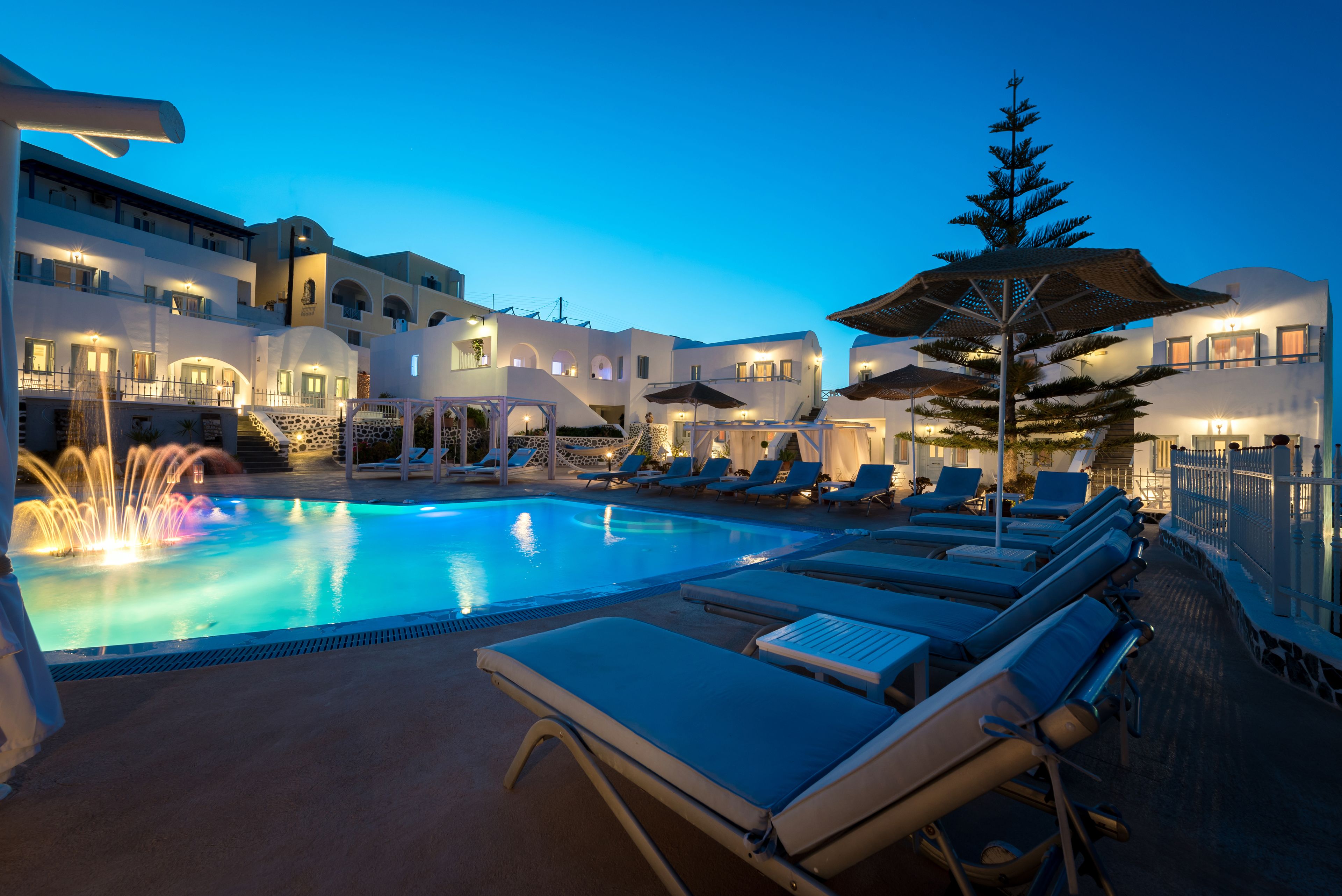 seasonal outdoor pool, pool umbrellas, pool loungers