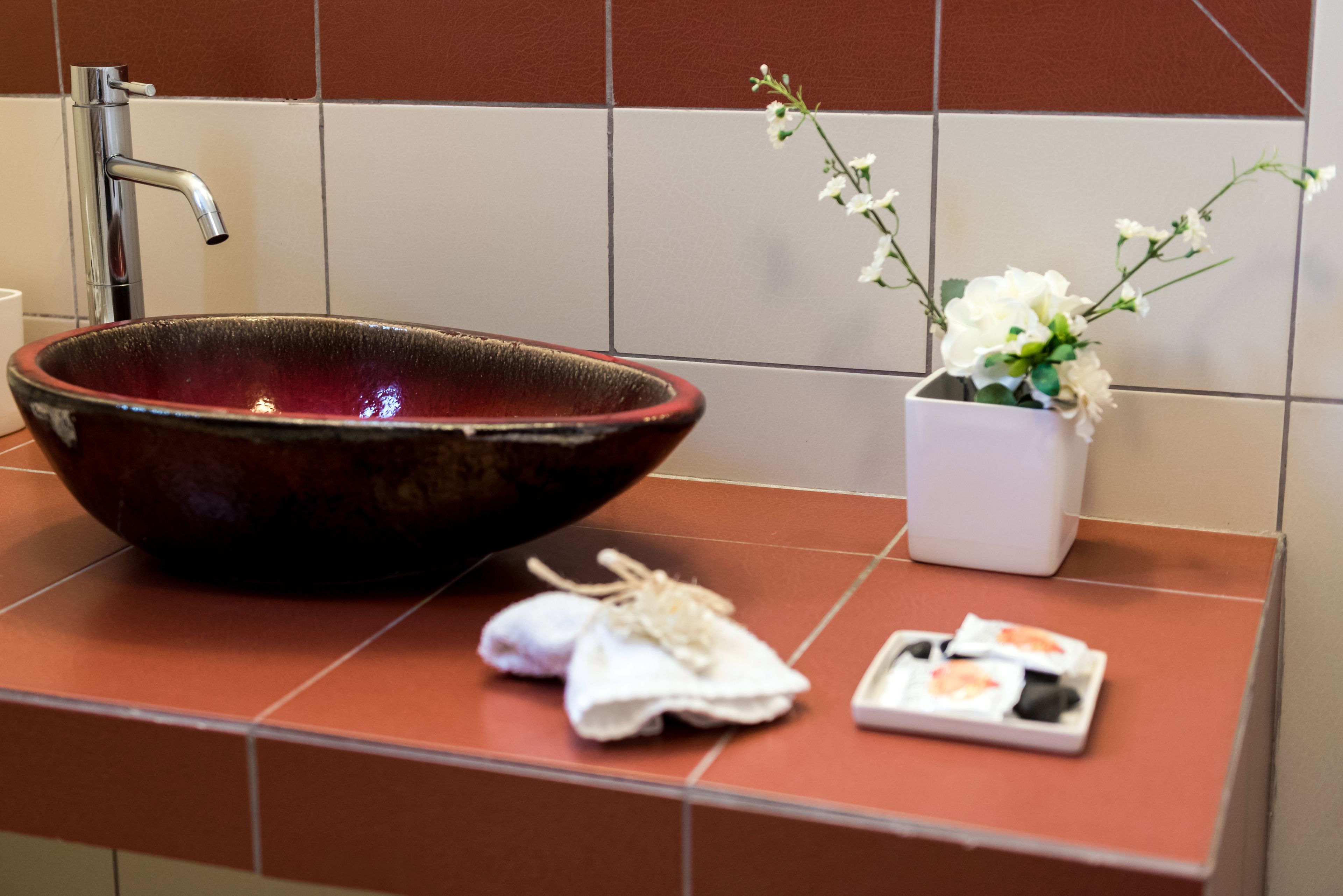 suite | bathroom | designer toiletries, hair dryer, bathrobes, slippers