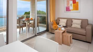 Standard Apartment, 1 Bedroom, Balcony, Sea Facing | Living area | 80-cm TV with digital channels, table tennis