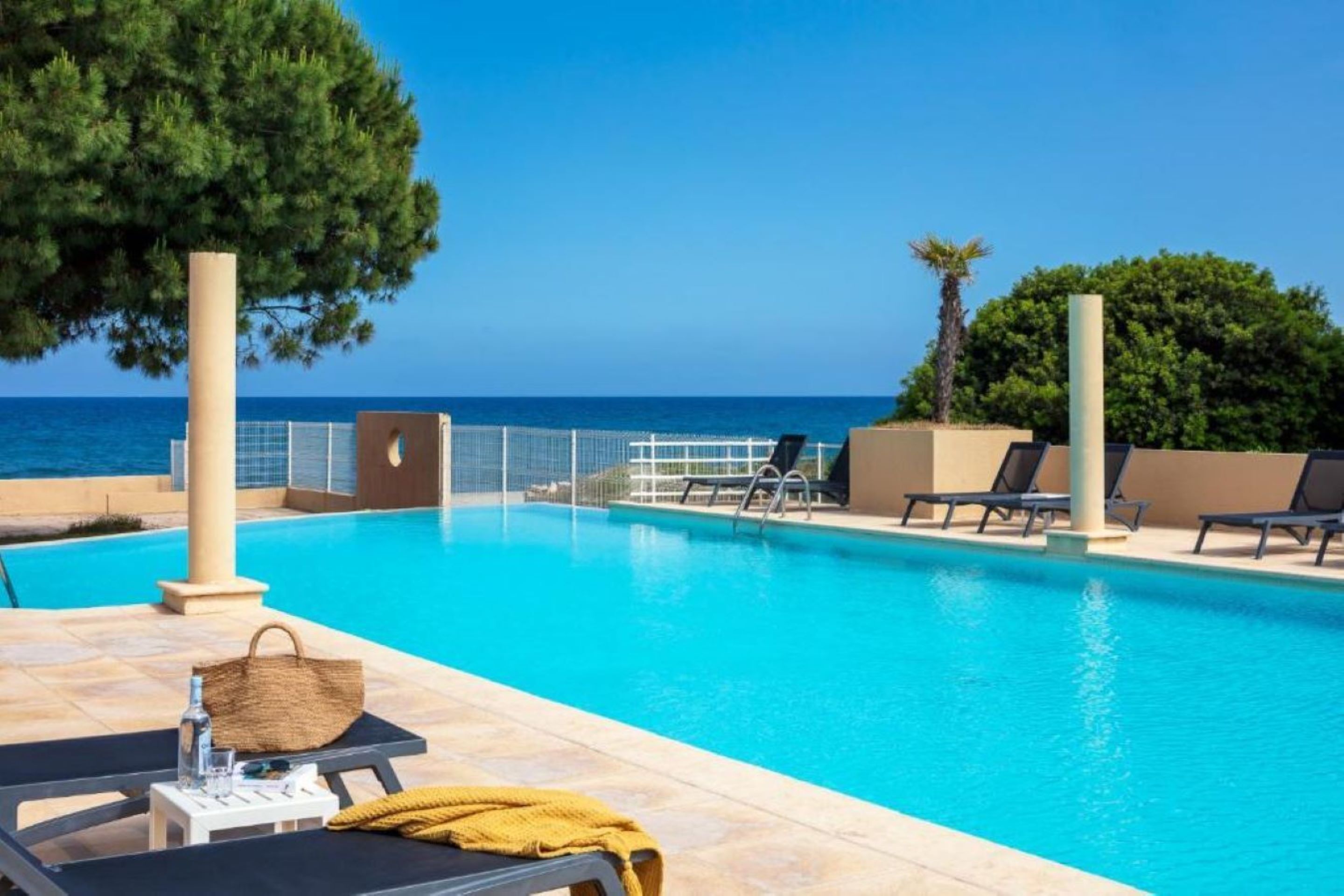 Seasonal outdoor pool, open 9:00 AM to 7:00 PM, sun loungers