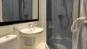 Shower, free toiletries, hair dryer, towels