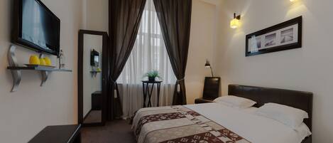 Premium bedding, in-room safe, individually decorated